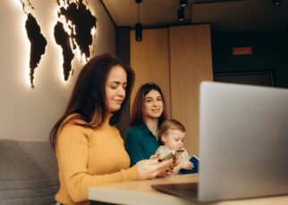 a young mother with a child in a travel agency