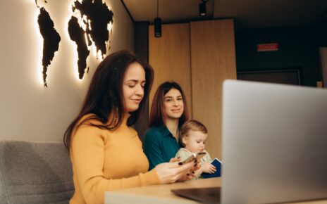 a young mother with a child in a travel agency